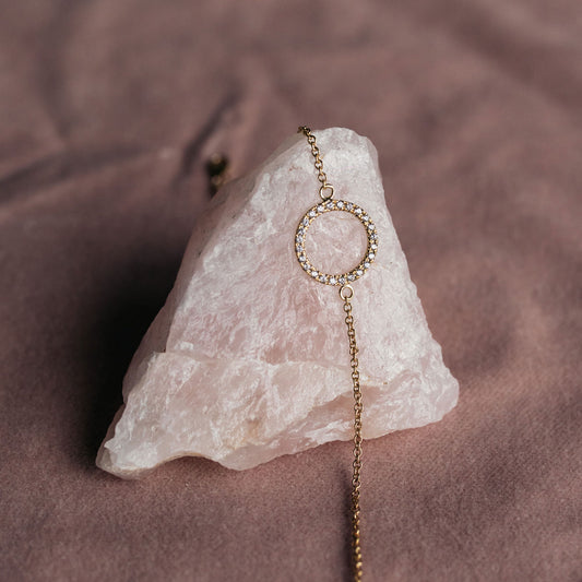 Elegant solid gold circle bracelet with 24 sparkling white diamonds, handmade by Leesha Fine Jewellery