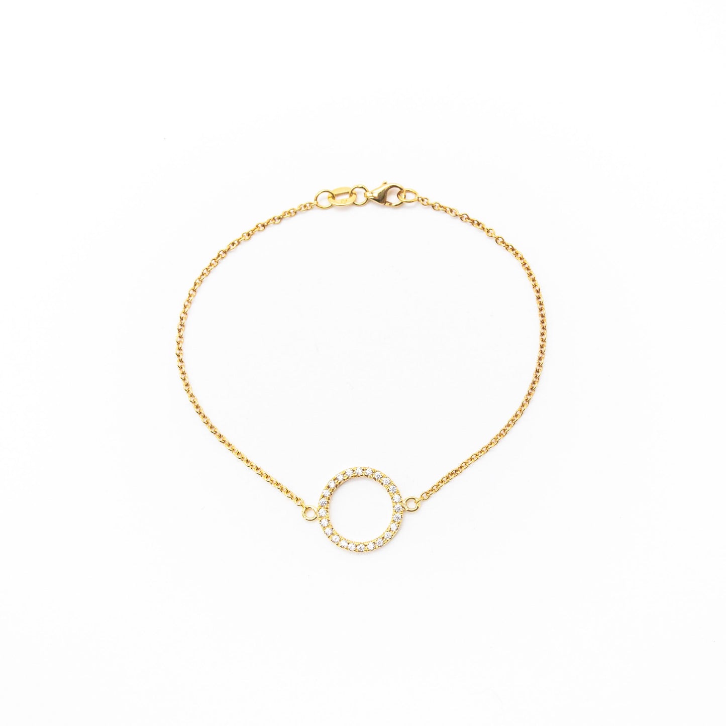 Elegant solid gold circle bracelet with 24 sparkling white diamonds, handmade by Leesha Fine Jewellery