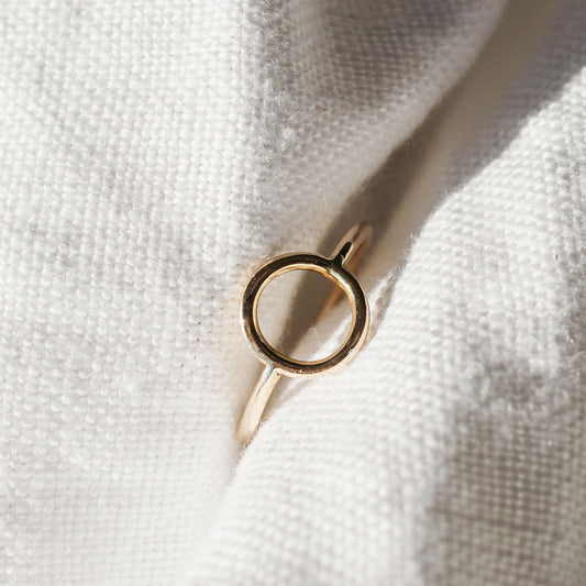 Stackable minimalist gold ring with circular design, made in South Africa