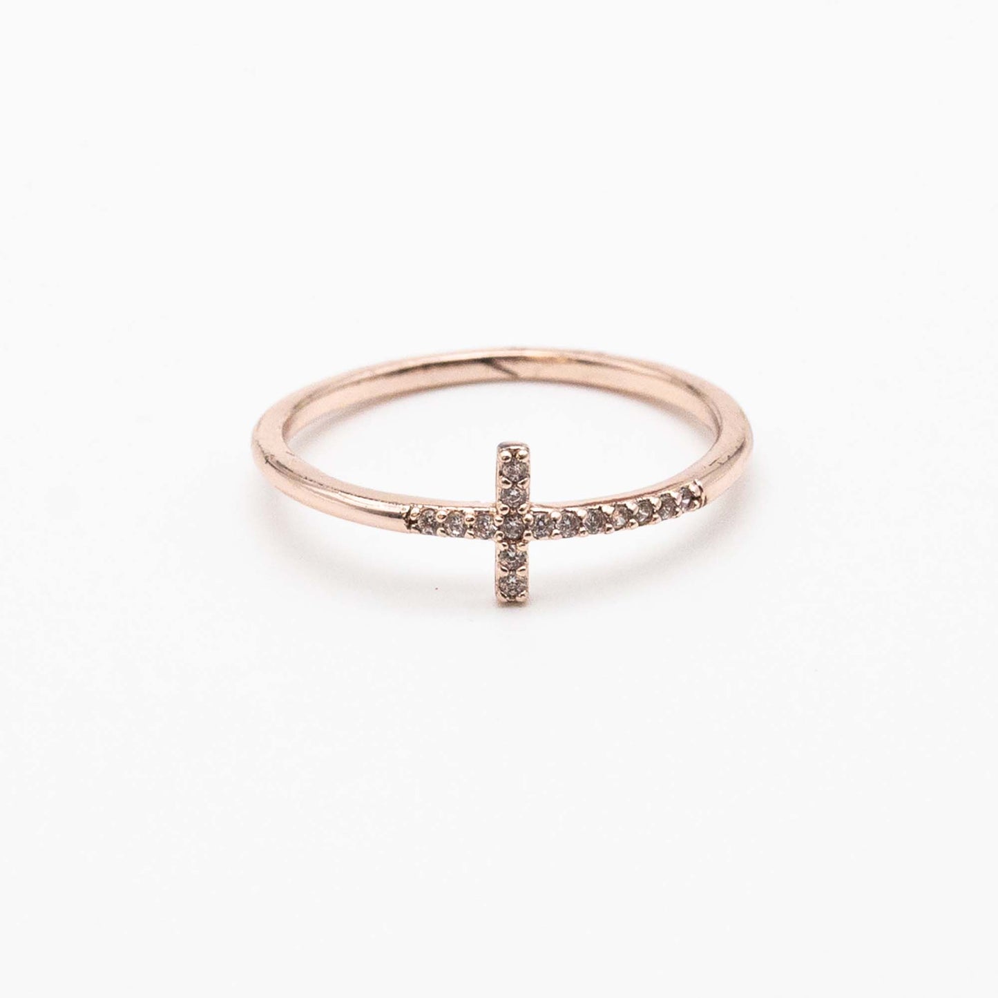 Minimalist gold cross ring with diamonds – spiritual fine jewellery.