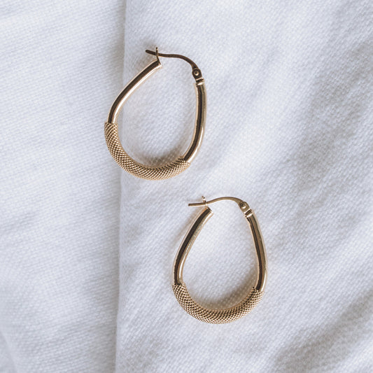 Set of hollow oval-shaped 9ct gold hoop earrings