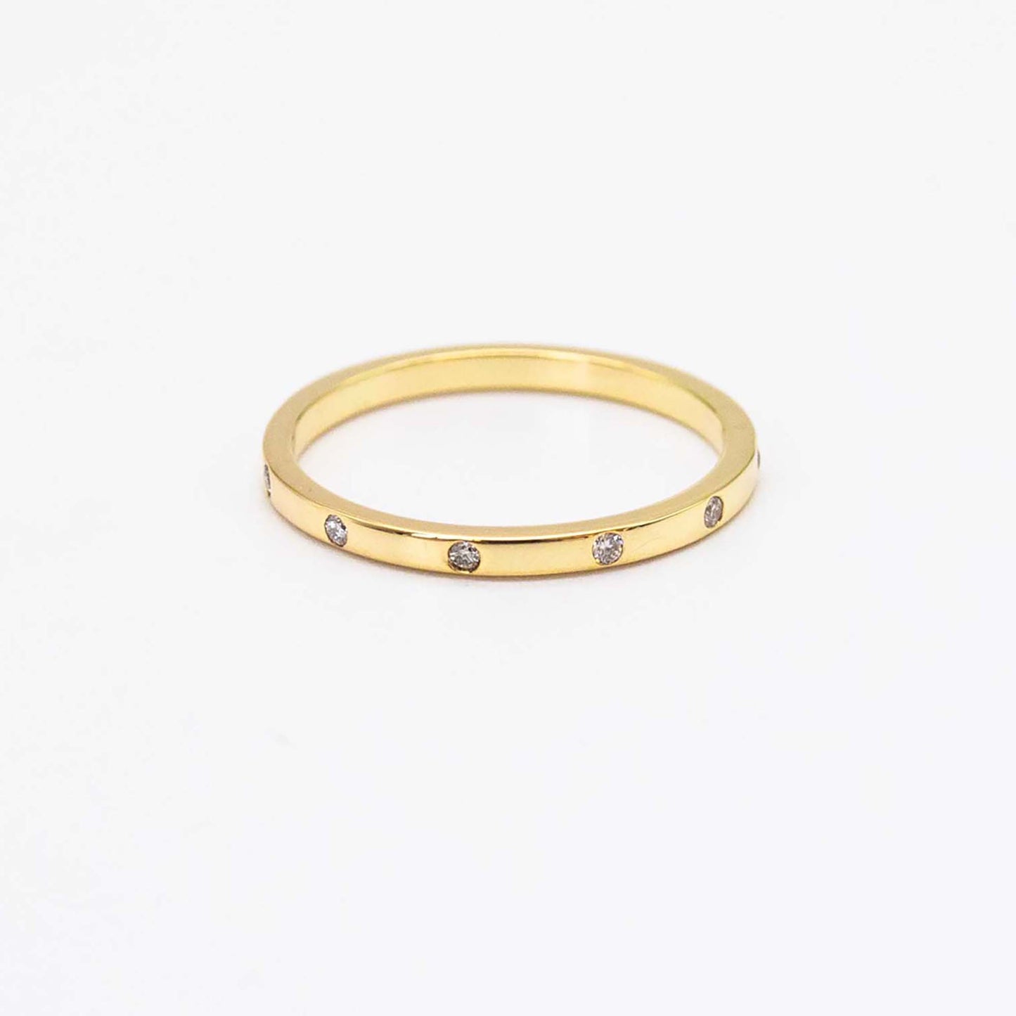 Gypsy ring in 9ct solid gold with six flush-set white diamonds – handcrafted fine jewellery.
