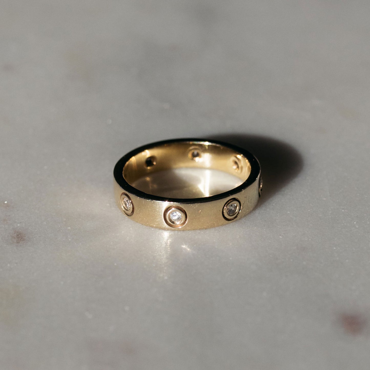Iconic statement ring with 8 white diamonds – handcrafted in South Africa.