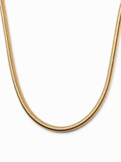 2.8mm flat snake chain in 9ct yellow gold on a white background