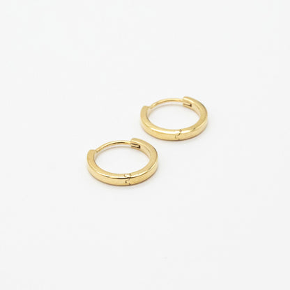 Bold mini gold hoop earrings from Leesha Fine Jewellery on a white background.