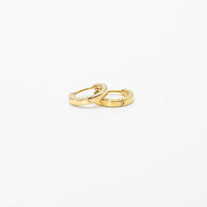 Bold mini gold hoop earrings from Leesha Fine Jewellery on a white background.