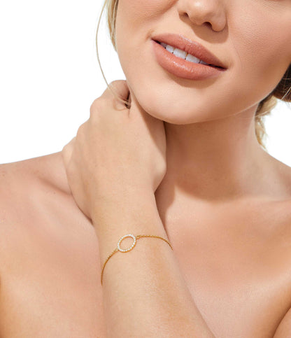 Elegant solid gold circle bracelet with 24 sparkling white diamonds, handmade by Leesha Fine Jewellery