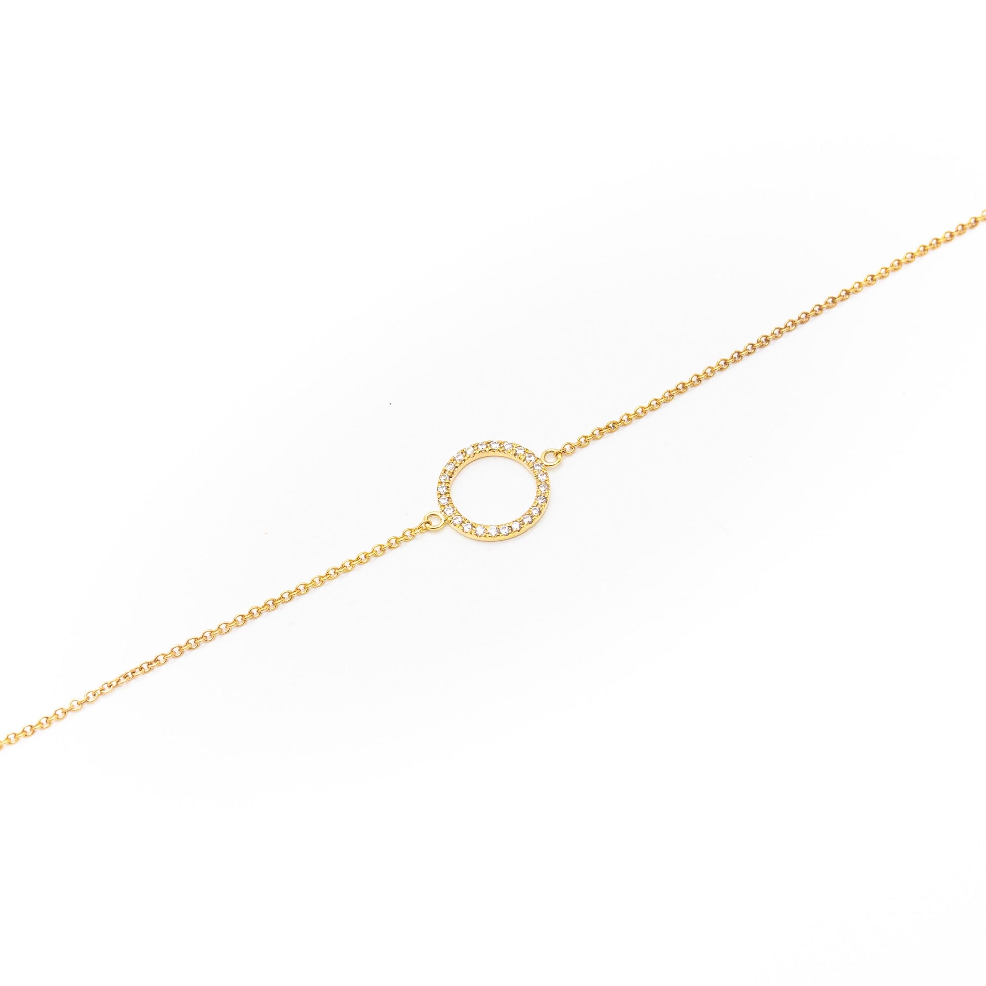 Elegant solid gold circle bracelet with 24 sparkling white diamonds, handmade by Leesha Fine Jewellery