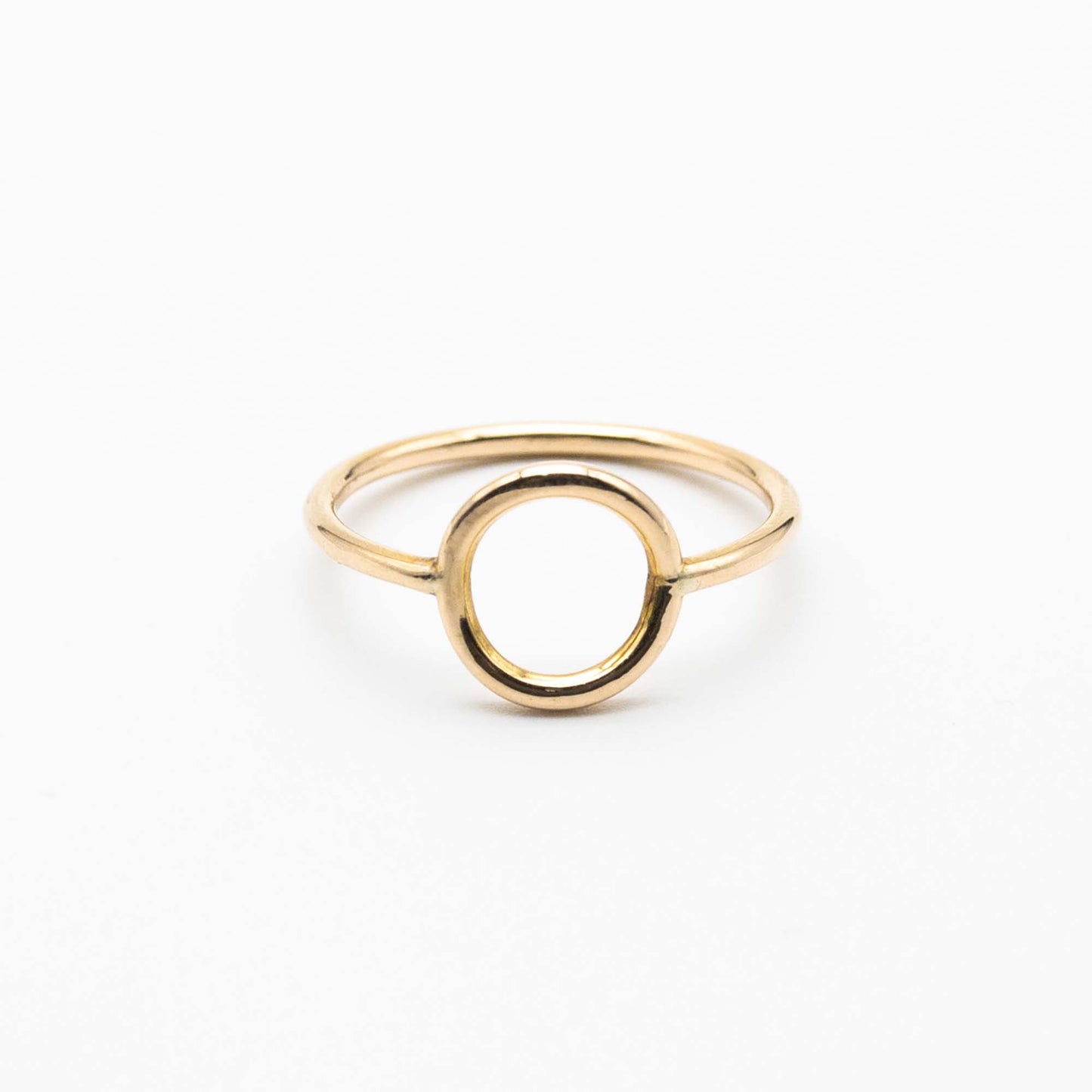 Stackable minimalist gold ring with circular design, made in South Africa