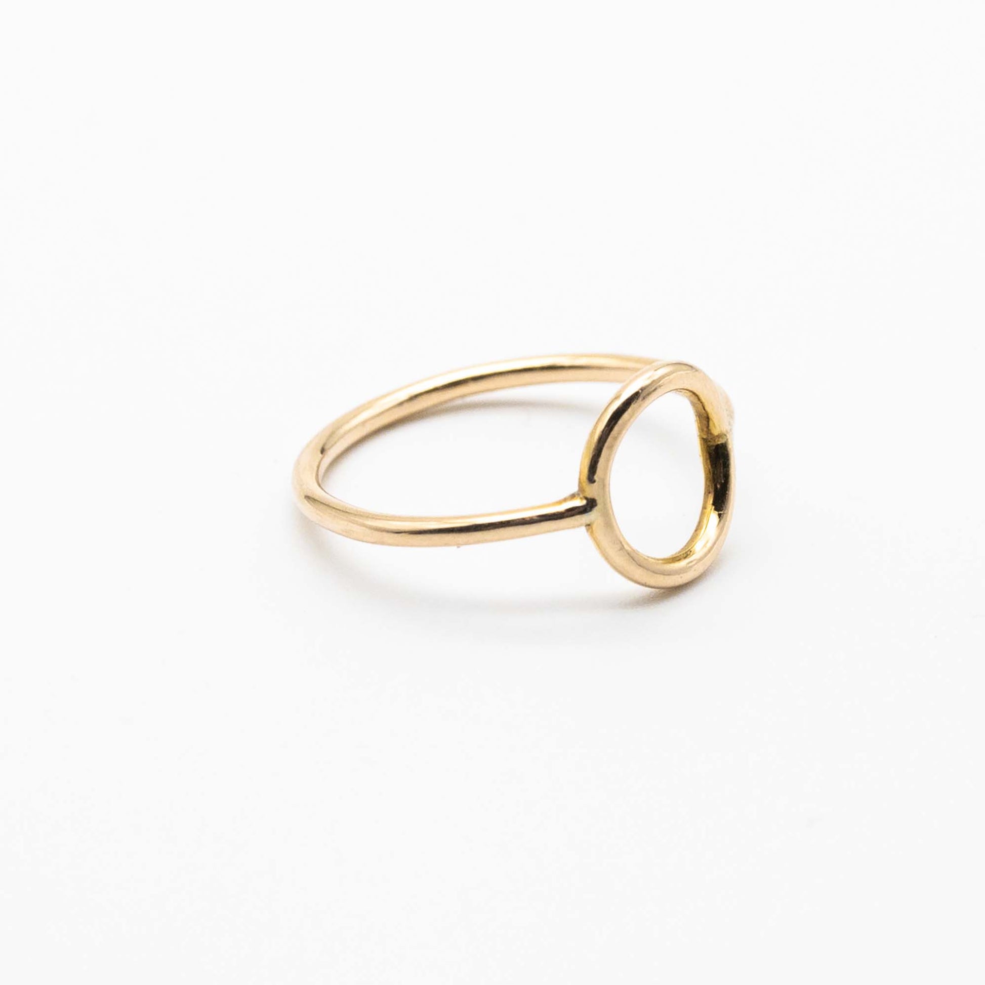 Stackable minimalist gold ring with circular design, made in South Africa