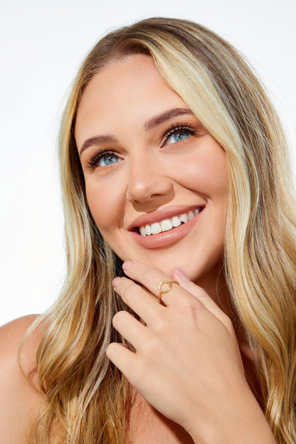 Stackable minimalist gold ring with circular design, made in South Africa