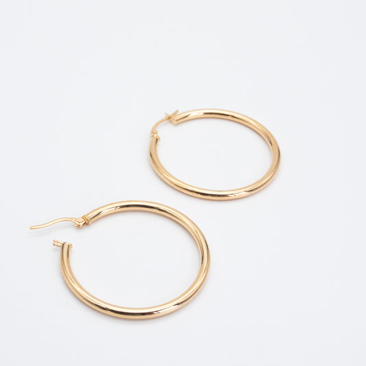 Classic Hoops shown side by side highlighting their polished gold finish