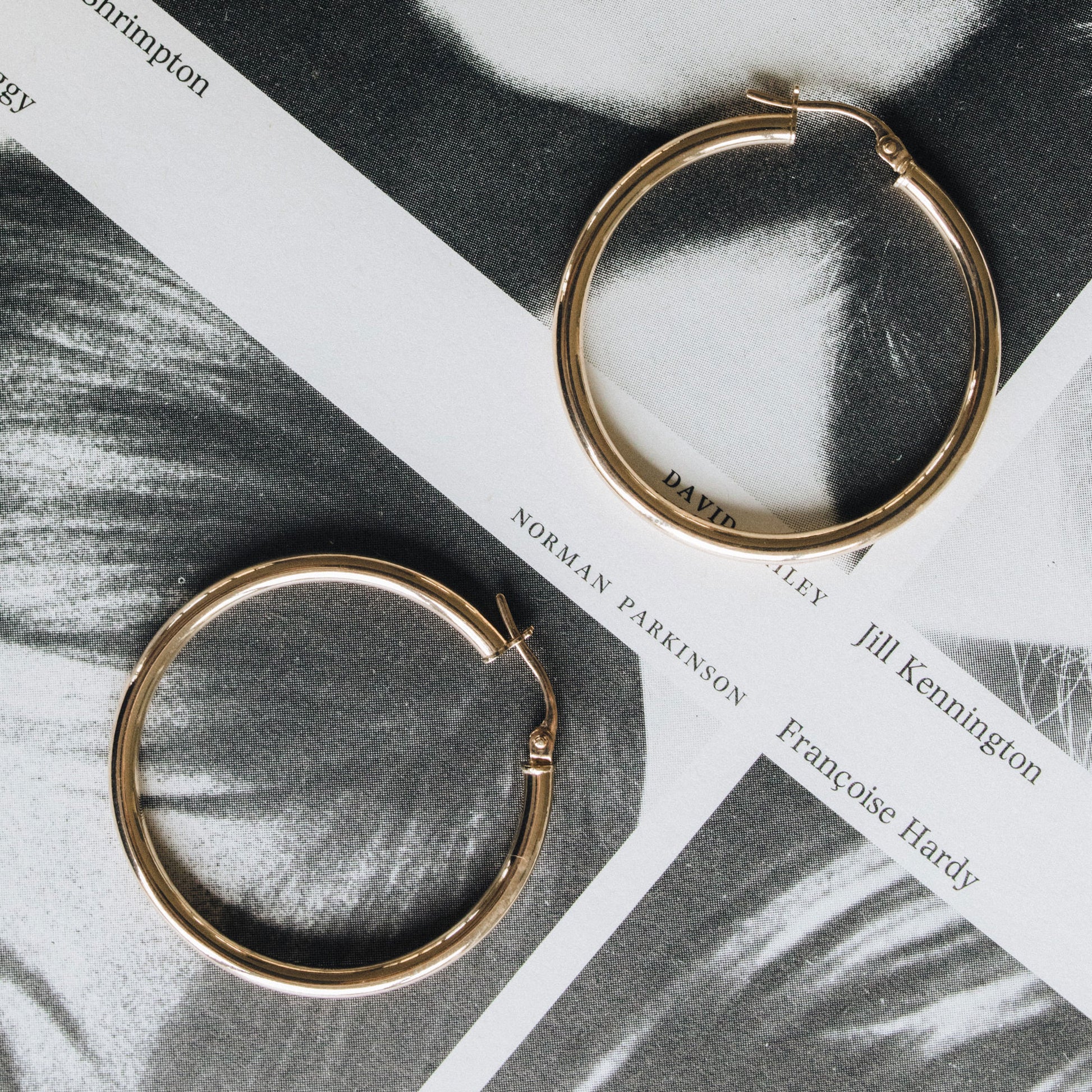 Classic Hoops shown side by side highlighting their polished gold finish