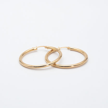 Classic Hoops shown side by side highlighting their polished gold finish
