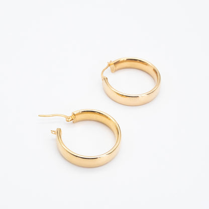 Small 9ct gold D-shape hoops displayed together on white background