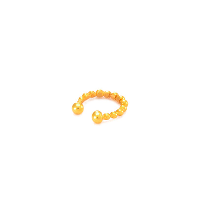 Dotted 9ct gold earring cuff displayed on a white background.