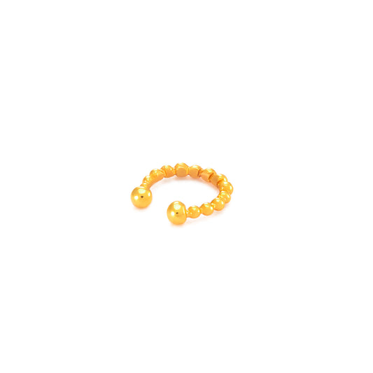 Dotted 9ct gold earring cuff displayed on a white background.