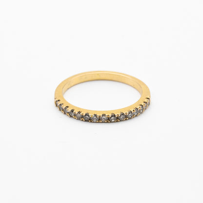Stackable half eternity ring with sparkling diamonds – minimalist luxury.