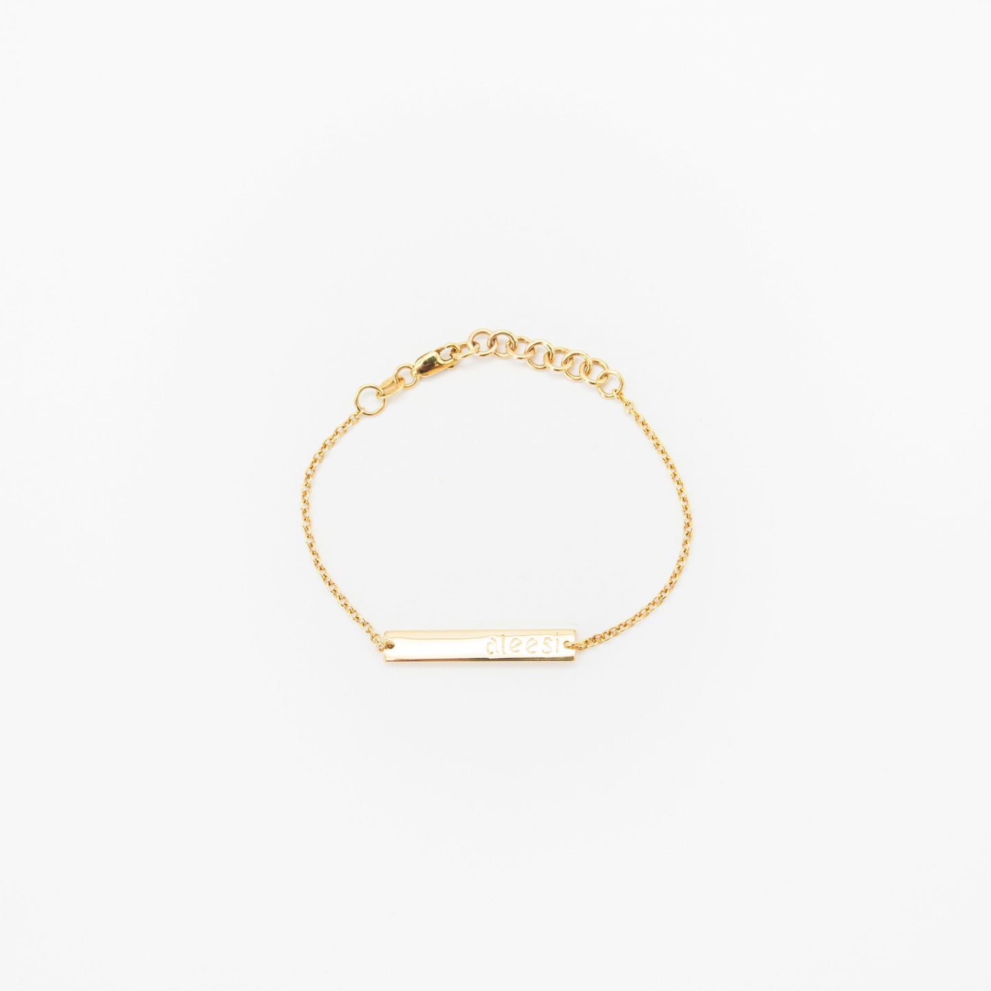 Personalised kids gold bracelet featuring custom engraved name plate, handcrafted by Leesha Fine Jewellery