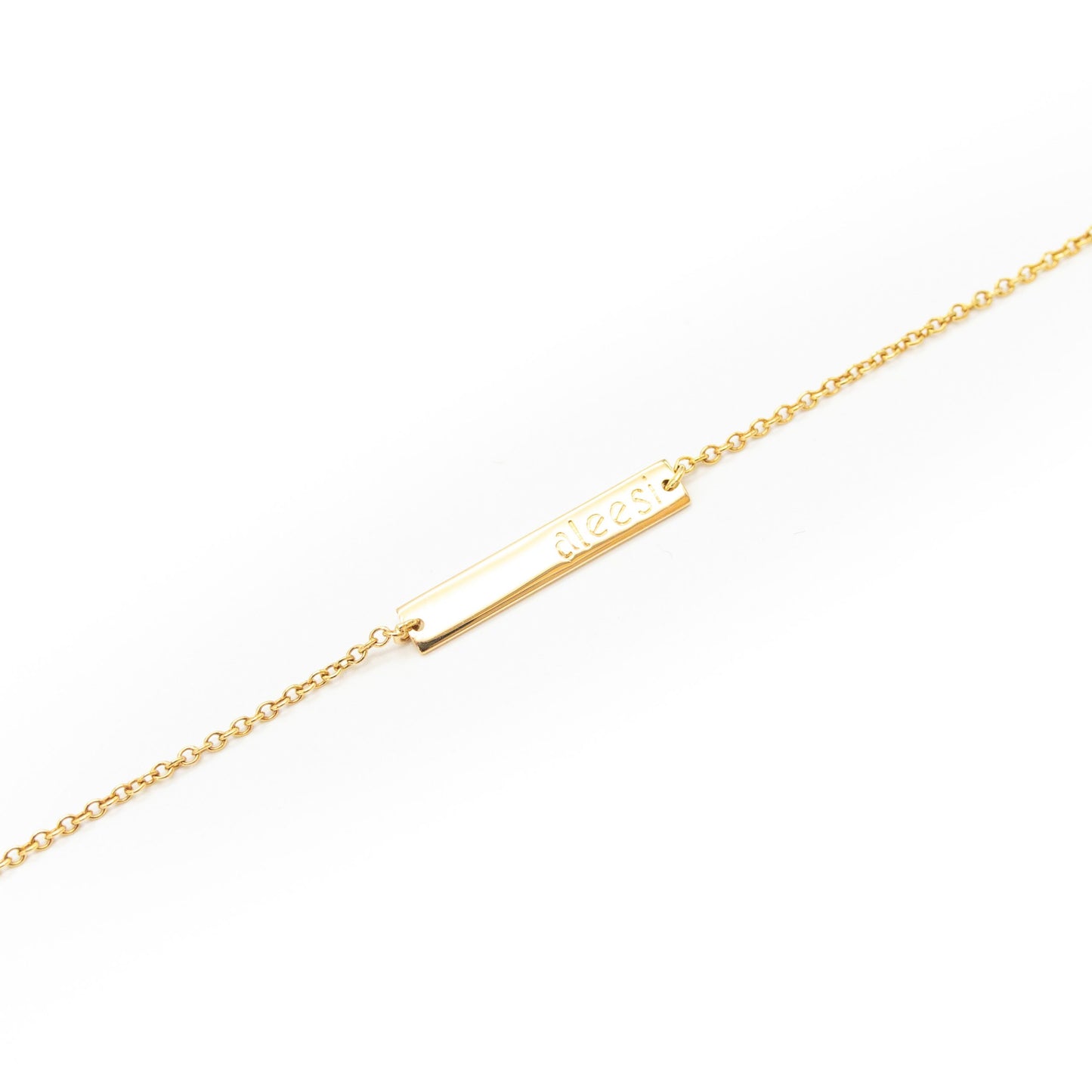 Personalised kids gold bracelet featuring custom engraved name plate, handcrafted by Leesha Fine Jewellery