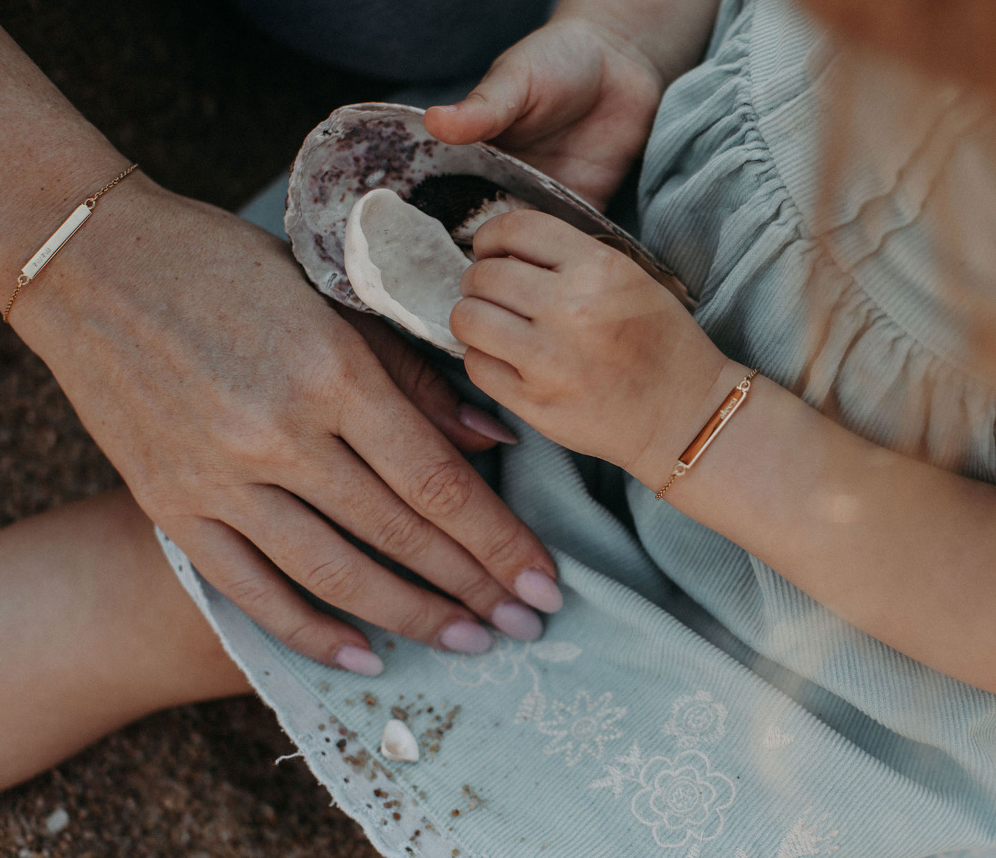 Personalised kids gold bracelet featuring custom engraved name plate, handcrafted by Leesha Fine Jewellery