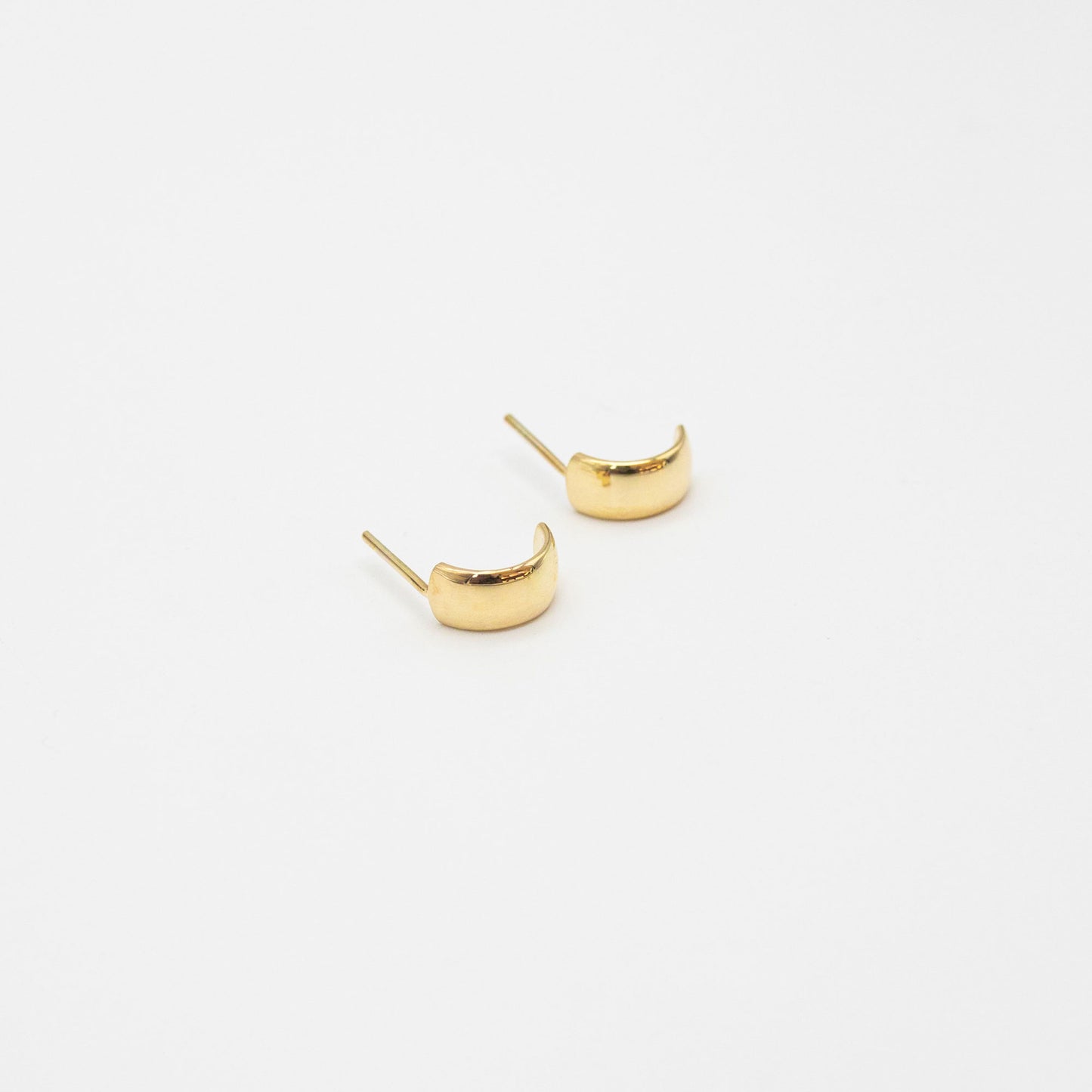 Single 9ct gold mini bold hoop earring showing smooth polished finish.