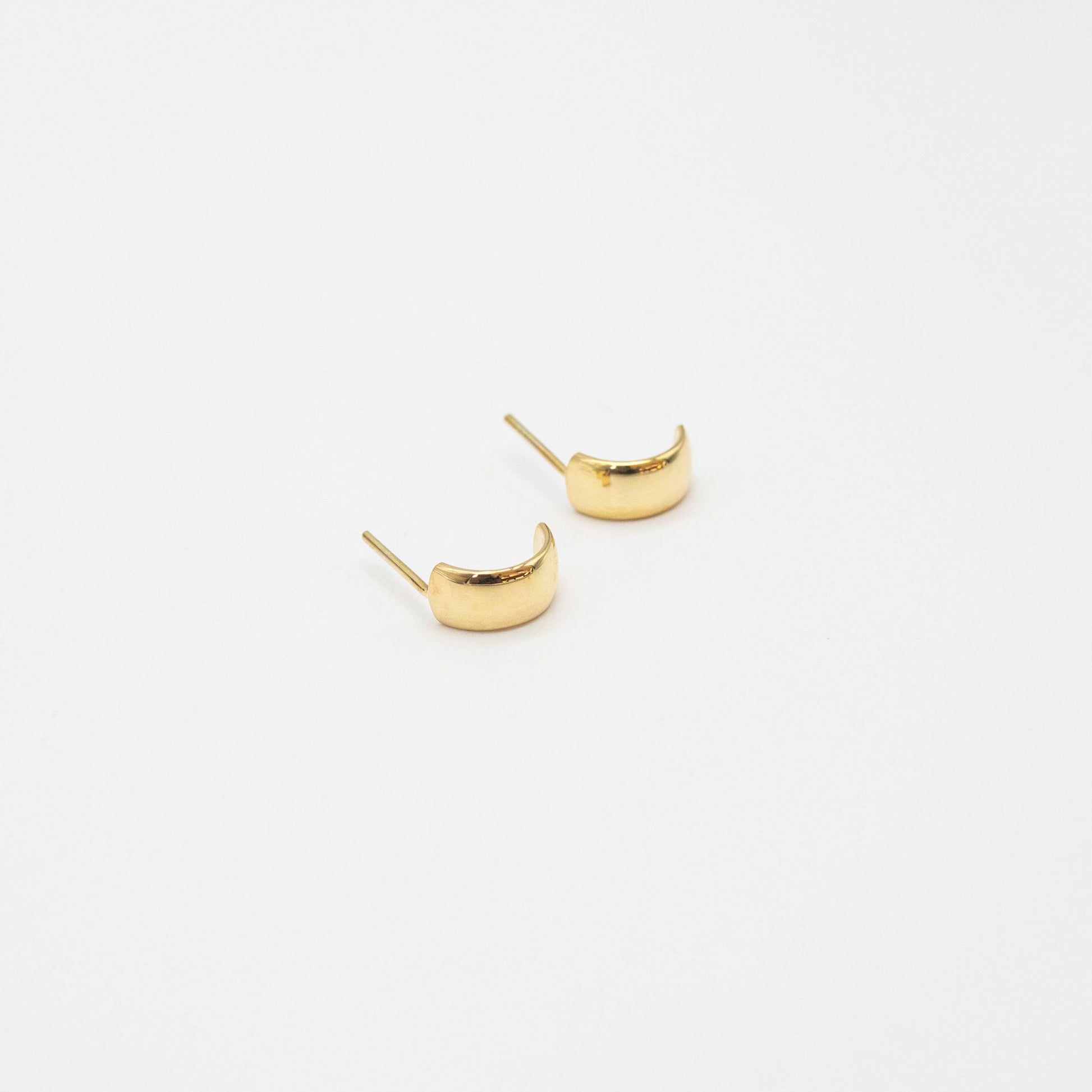 Single 9ct gold mini bold hoop earring showing smooth polished finish.