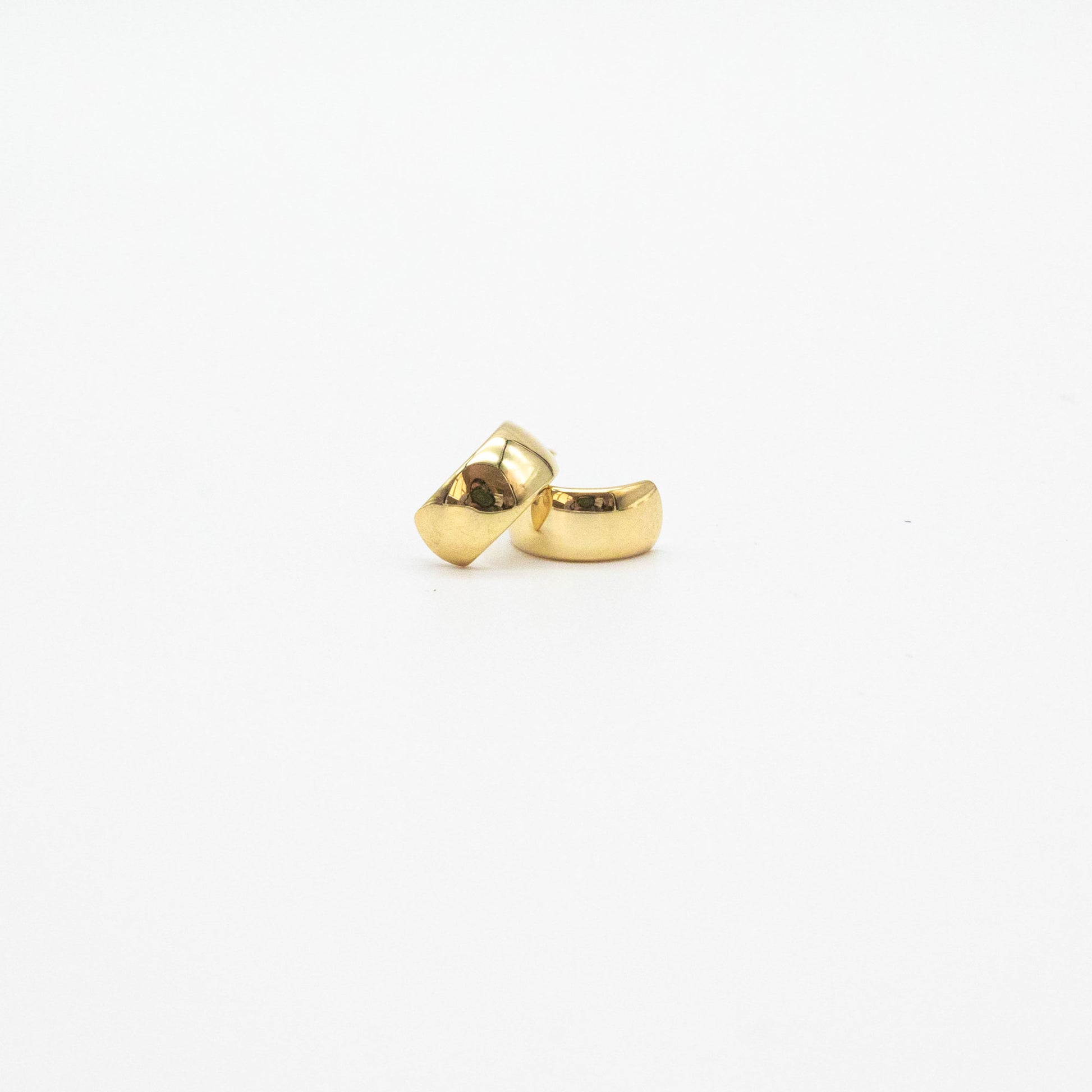 Single 9ct gold mini bold hoop earring showing smooth polished finish.