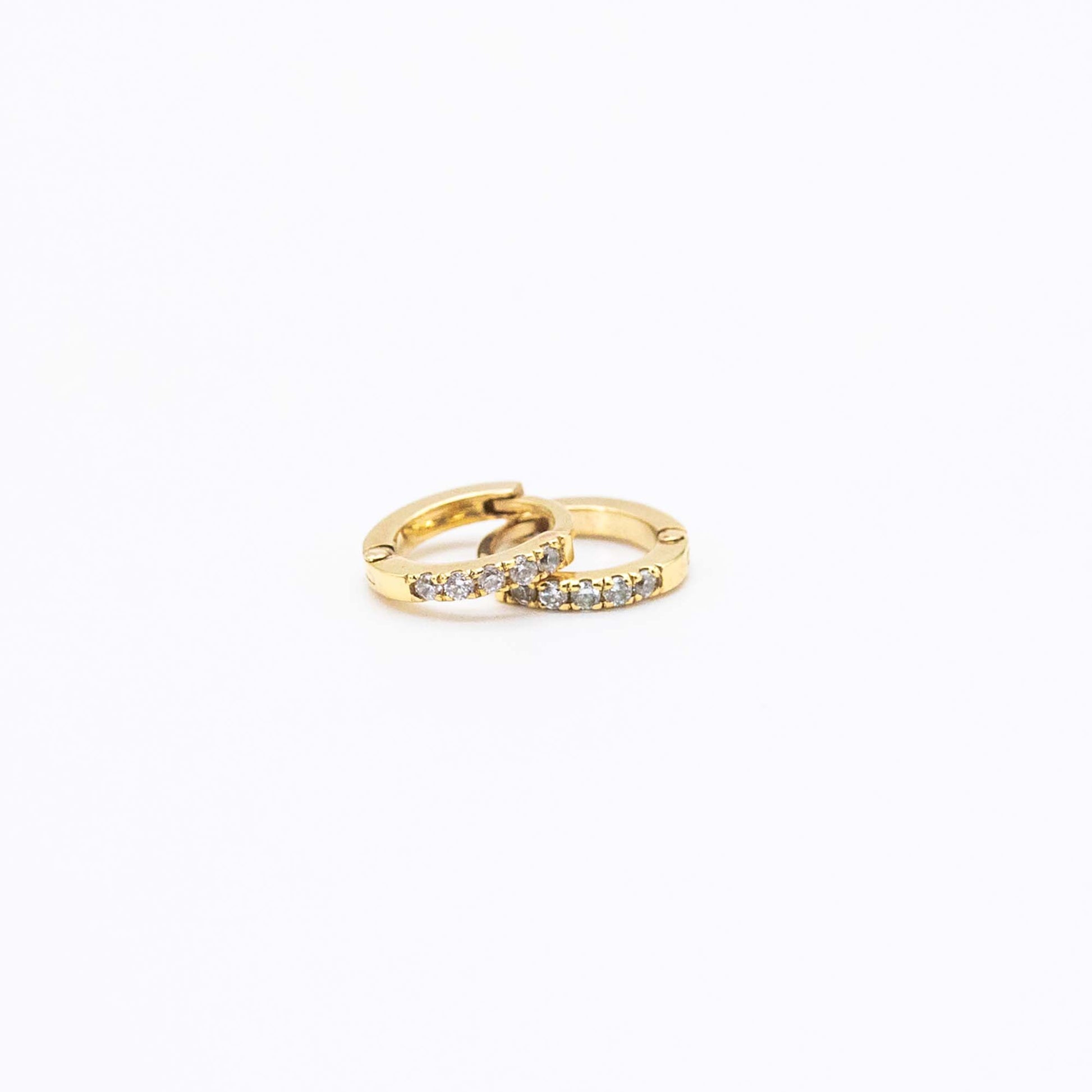 Pair of Mini Diamond Huggies 10mm in 9ct gold displayed on a white background
