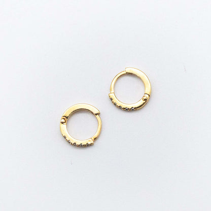 Pair of Mini Diamond Huggies 10mm in 9ct gold displayed on a white background