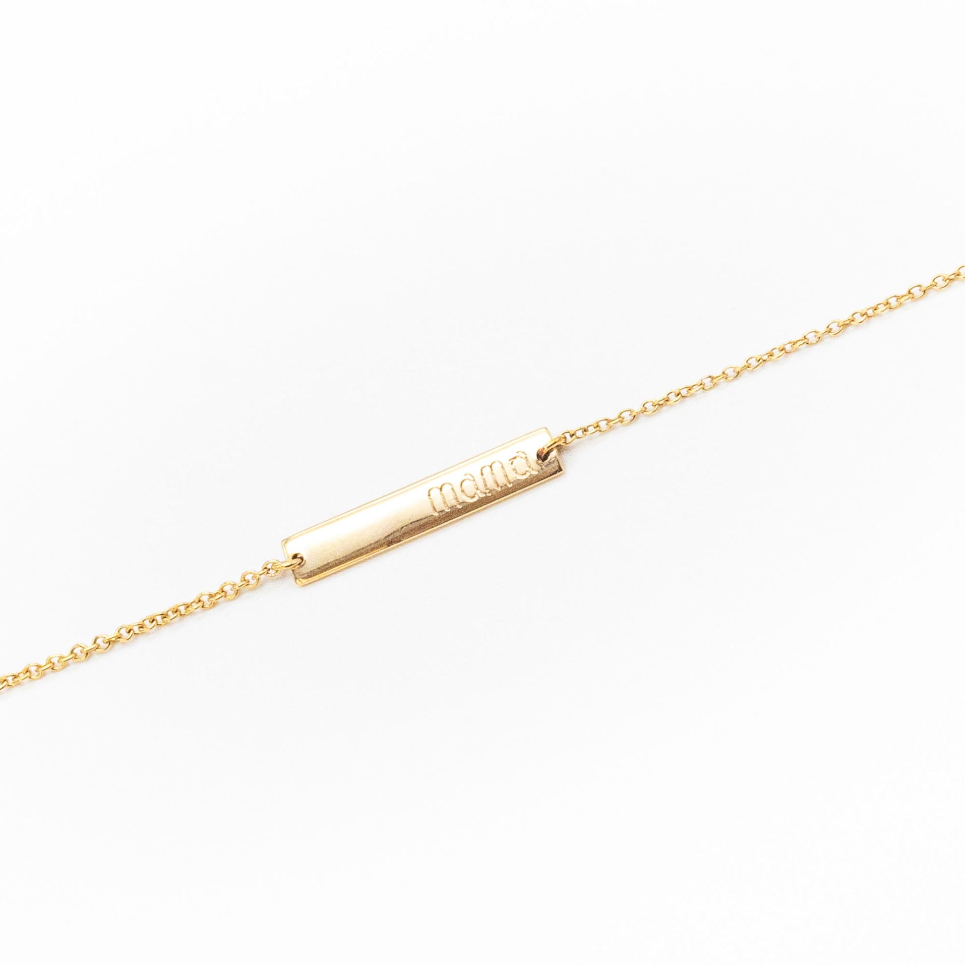 Personalised gold bracelet with sleek name plate design, handcrafted by Leesha Fine Jewellery