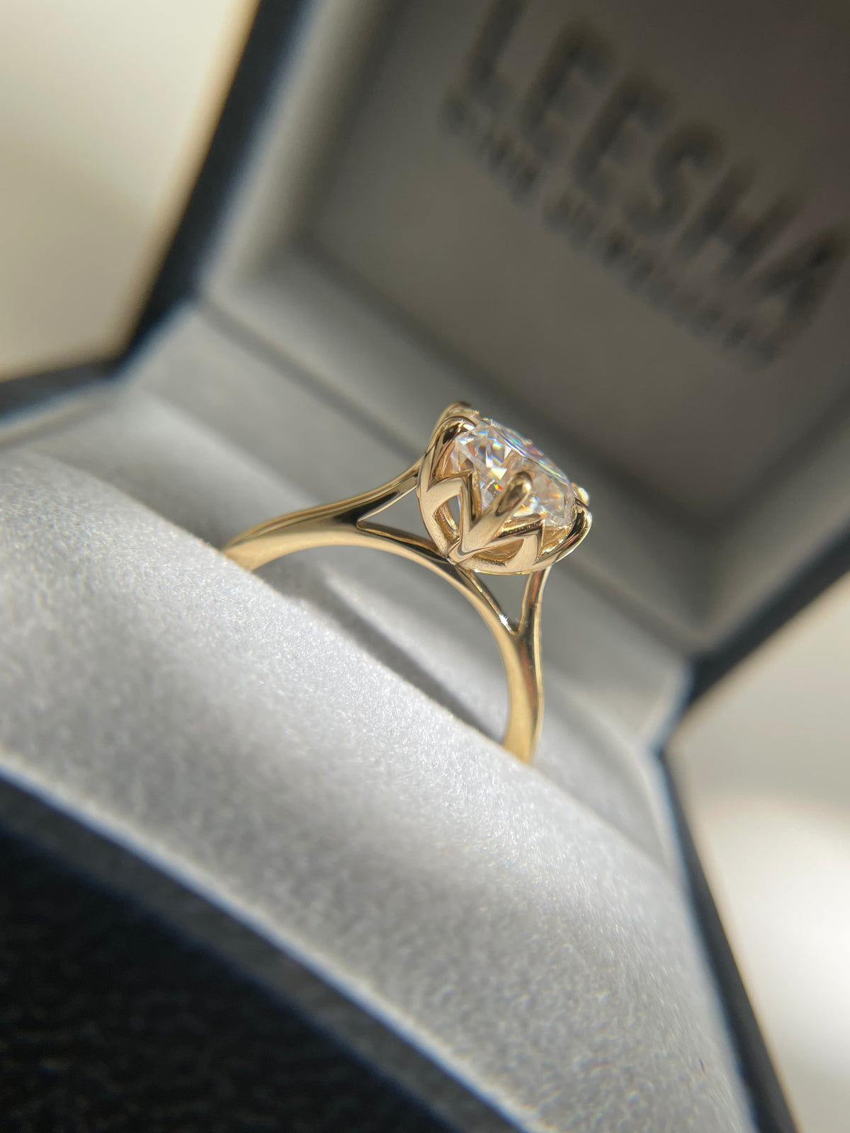 Round diamond solitaire ring in 9ct yellow gold