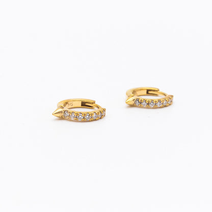 Pair of 9ct gold Spike Diamond Huggie earrings displayed on white background, showcasing front-facing diamonds.