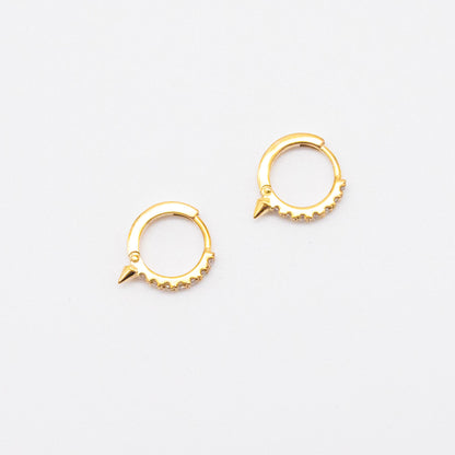 Pair of 9ct gold Spike Diamond Huggie earrings displayed on white background, showcasing front-facing diamonds.