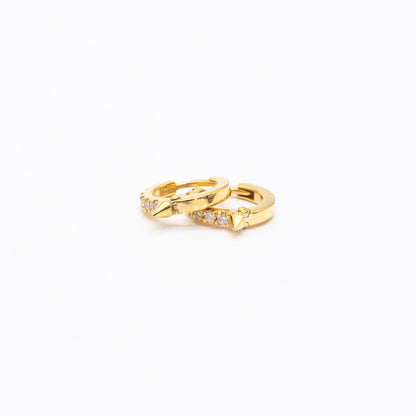 Pair of 9ct gold Spike Diamond Huggie earrings displayed on white background, showcasing front-facing diamonds.