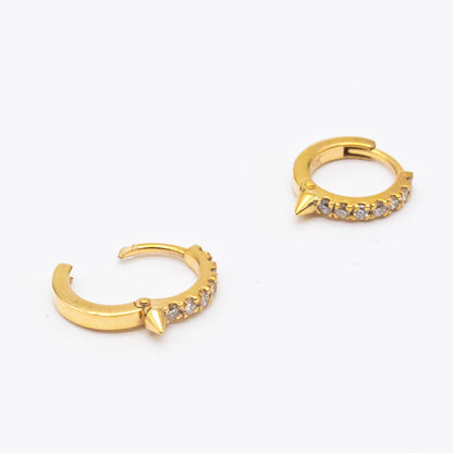 Pair of 9ct gold Spike Diamond Huggie earrings displayed on white background, showcasing front-facing diamonds.